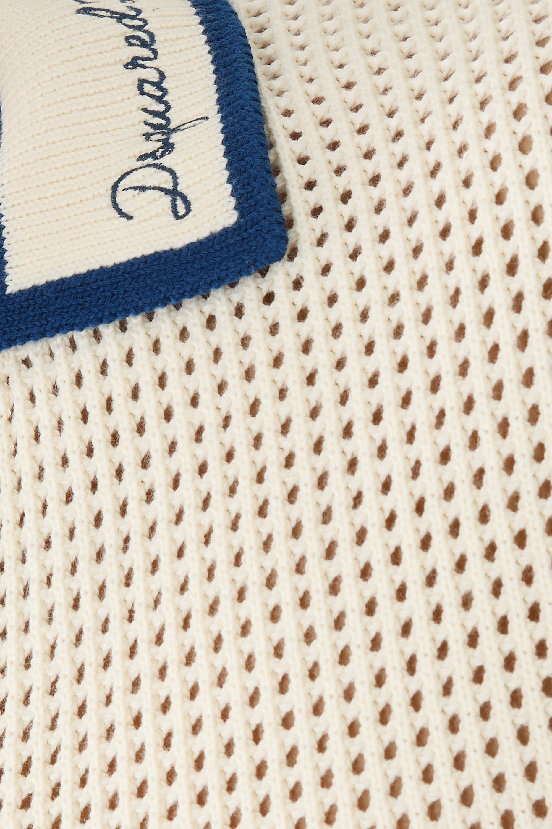 قميص بولو نسيج بفتحات