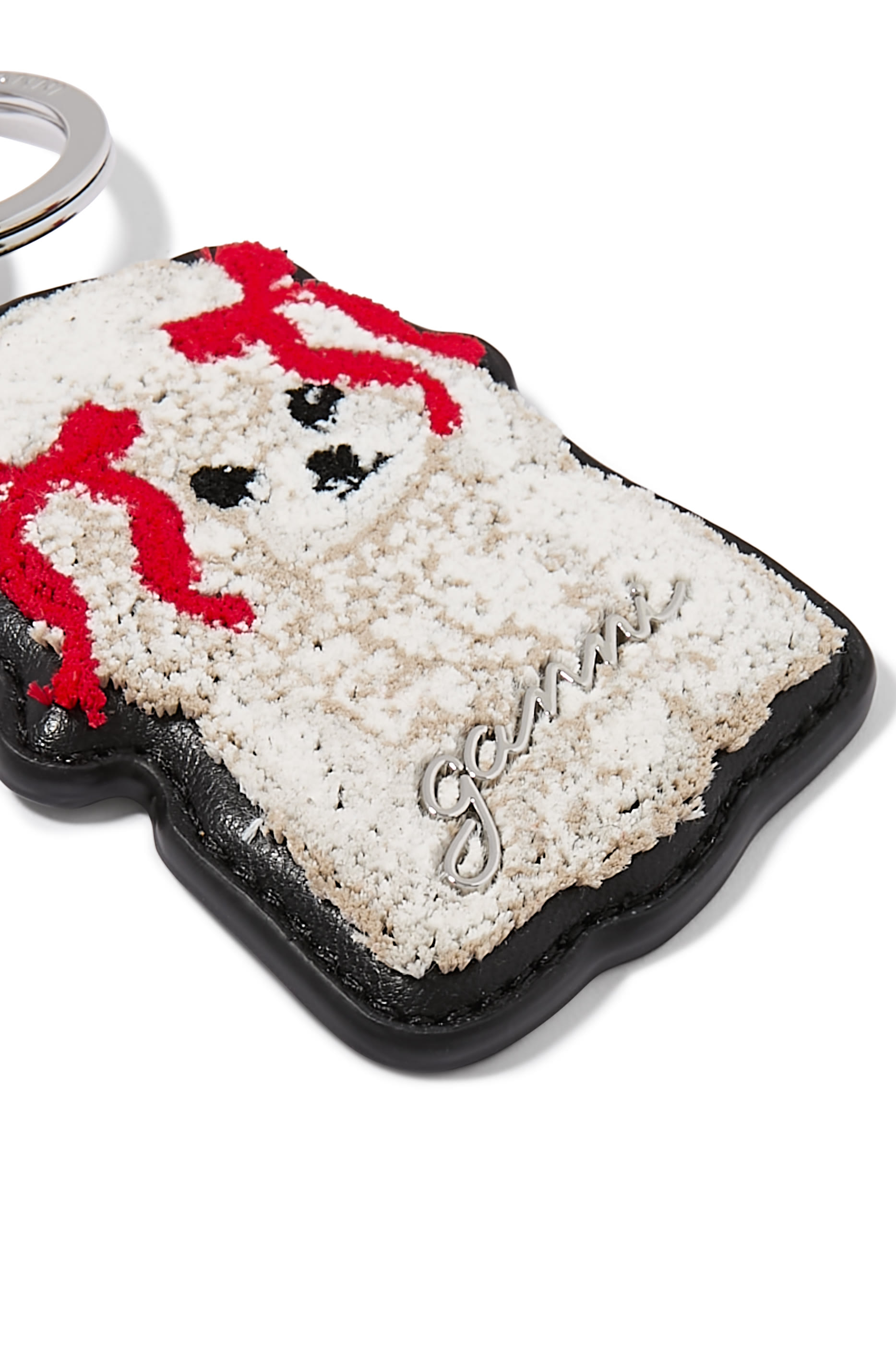 سلسلة مفاتيح بتصميم فيونكة كلب جوي