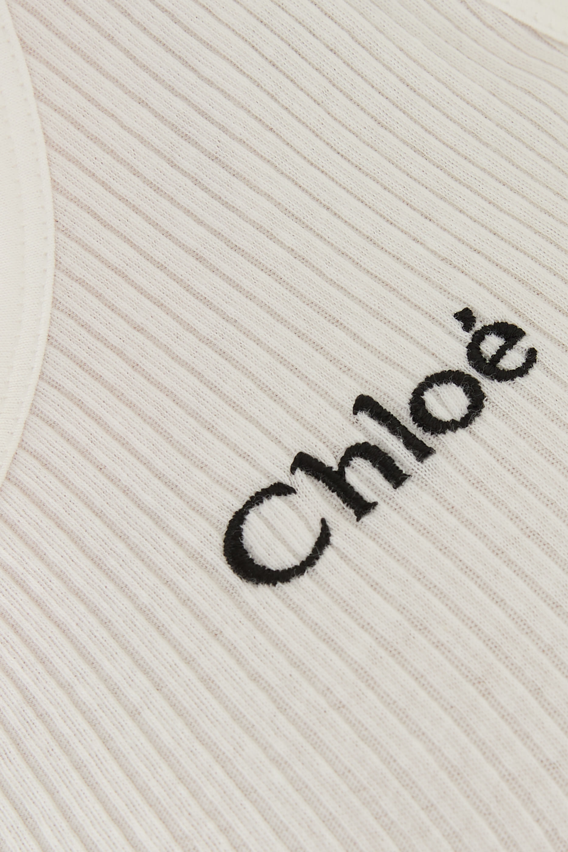 بلوزة بلا أكمام بشعار الماركة