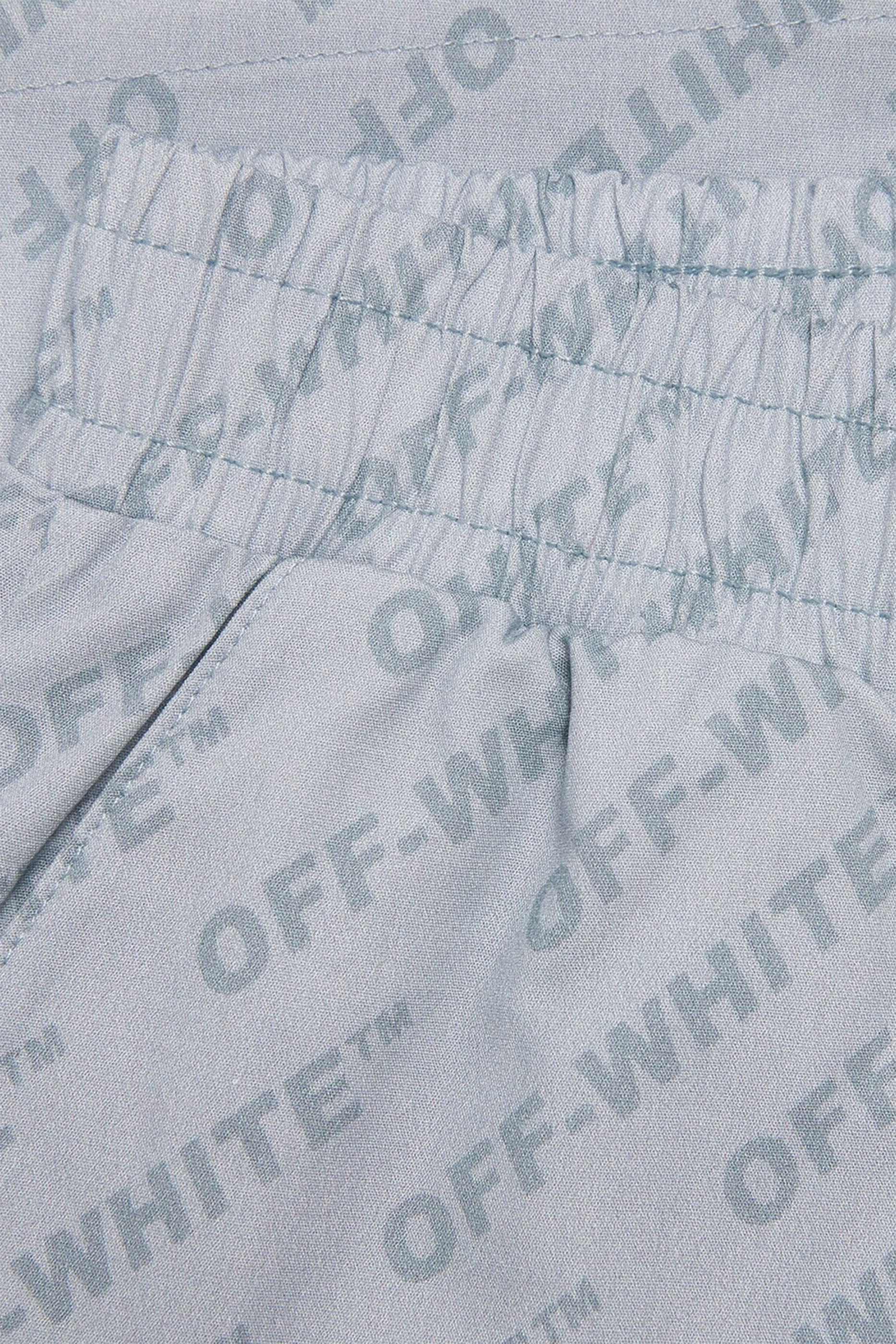 شورت بنقشات شعار الماركة للأطفال