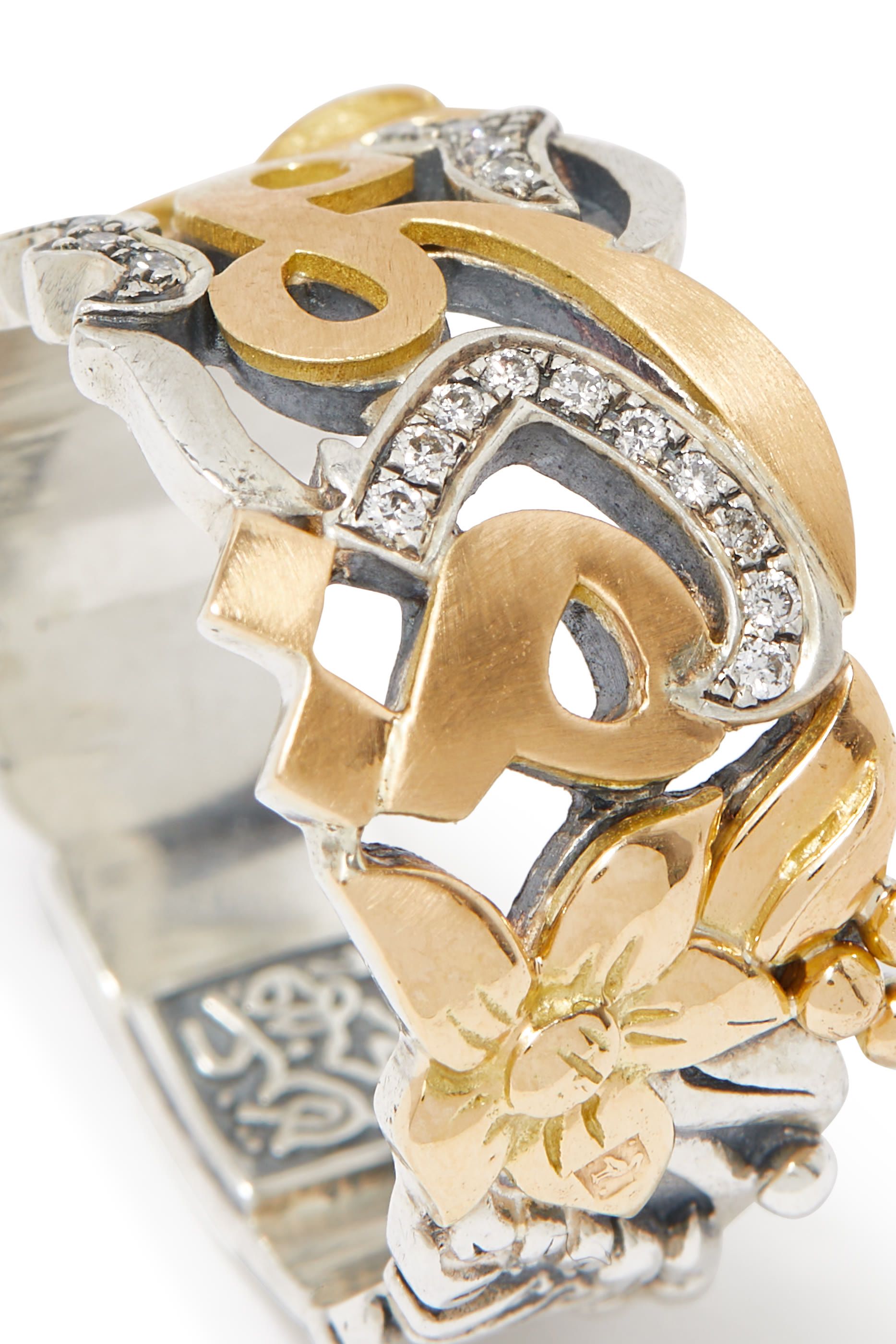 خاتم بكلمة مودة مرصع بالماس فضة إسترلينية وذهب عيار 18