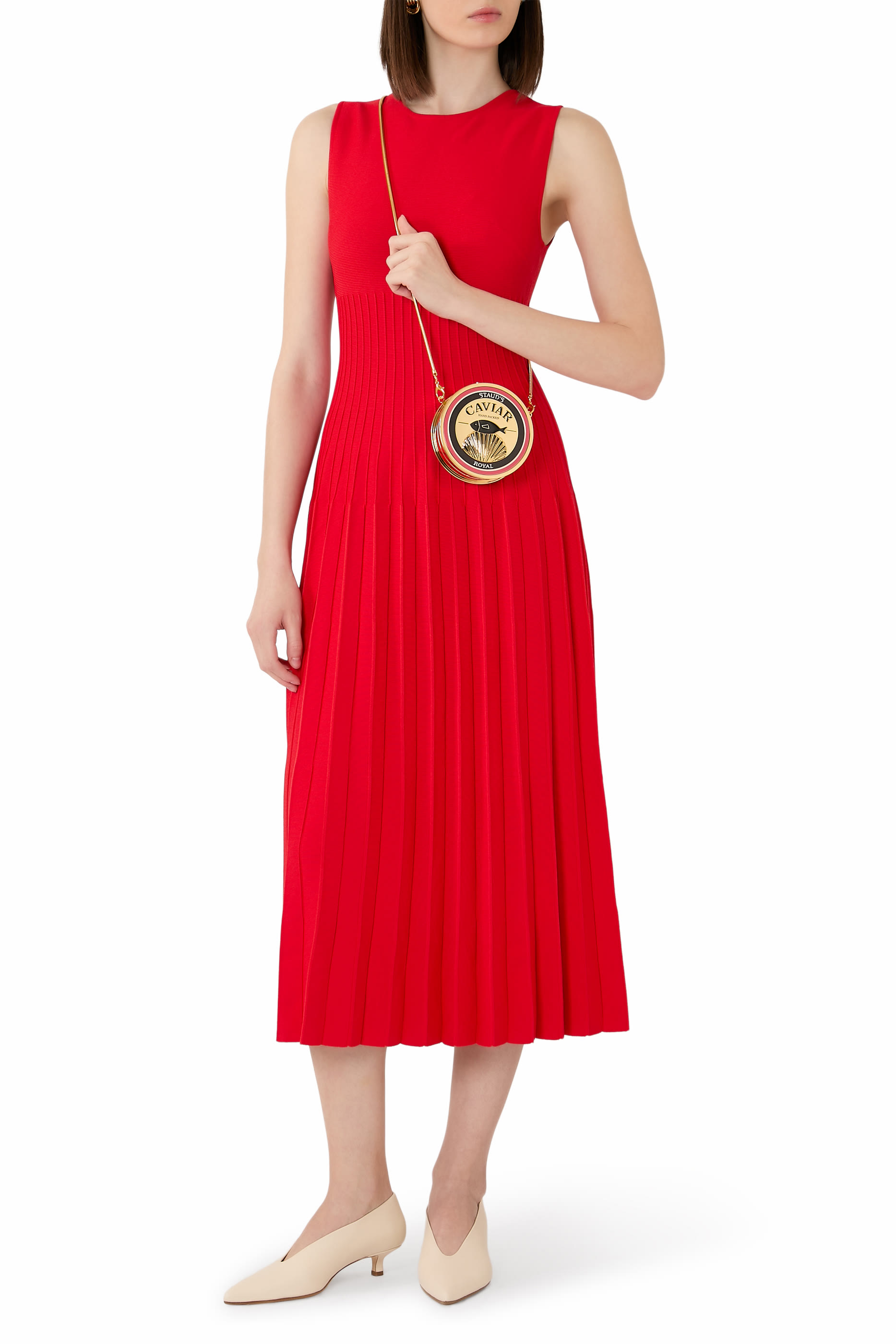 كلاتش بتصميم علبة كافيار معدنية