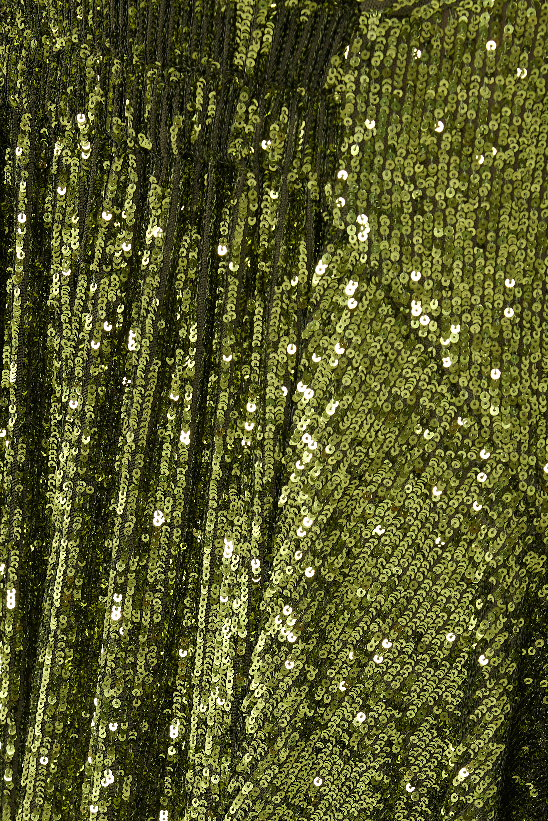 تنورة متوسطة الطول بتصميم غير متماثل مزينة بترتر