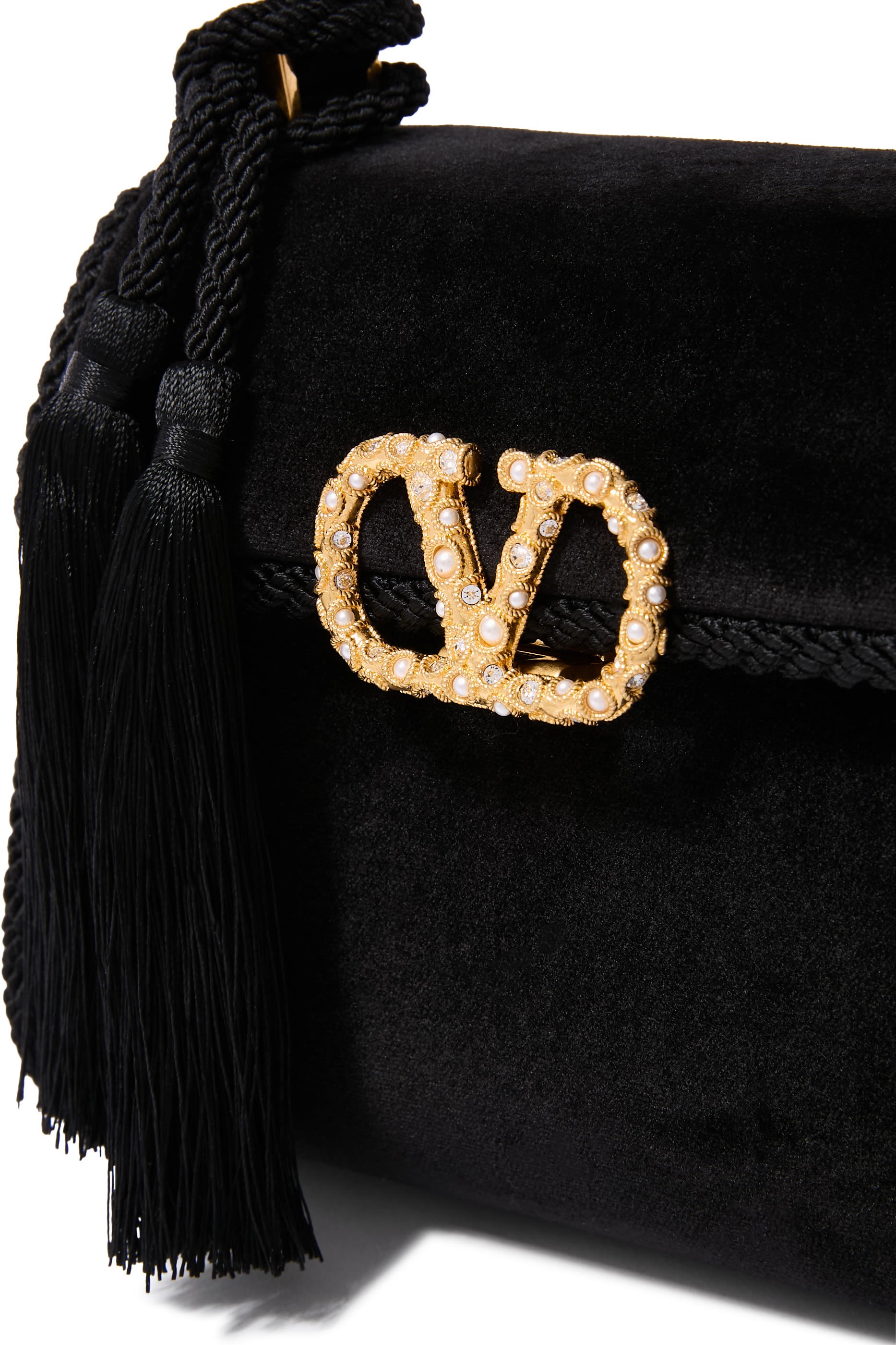 حقيبة بيد علوية مزينة بشعار الماركة مخمل