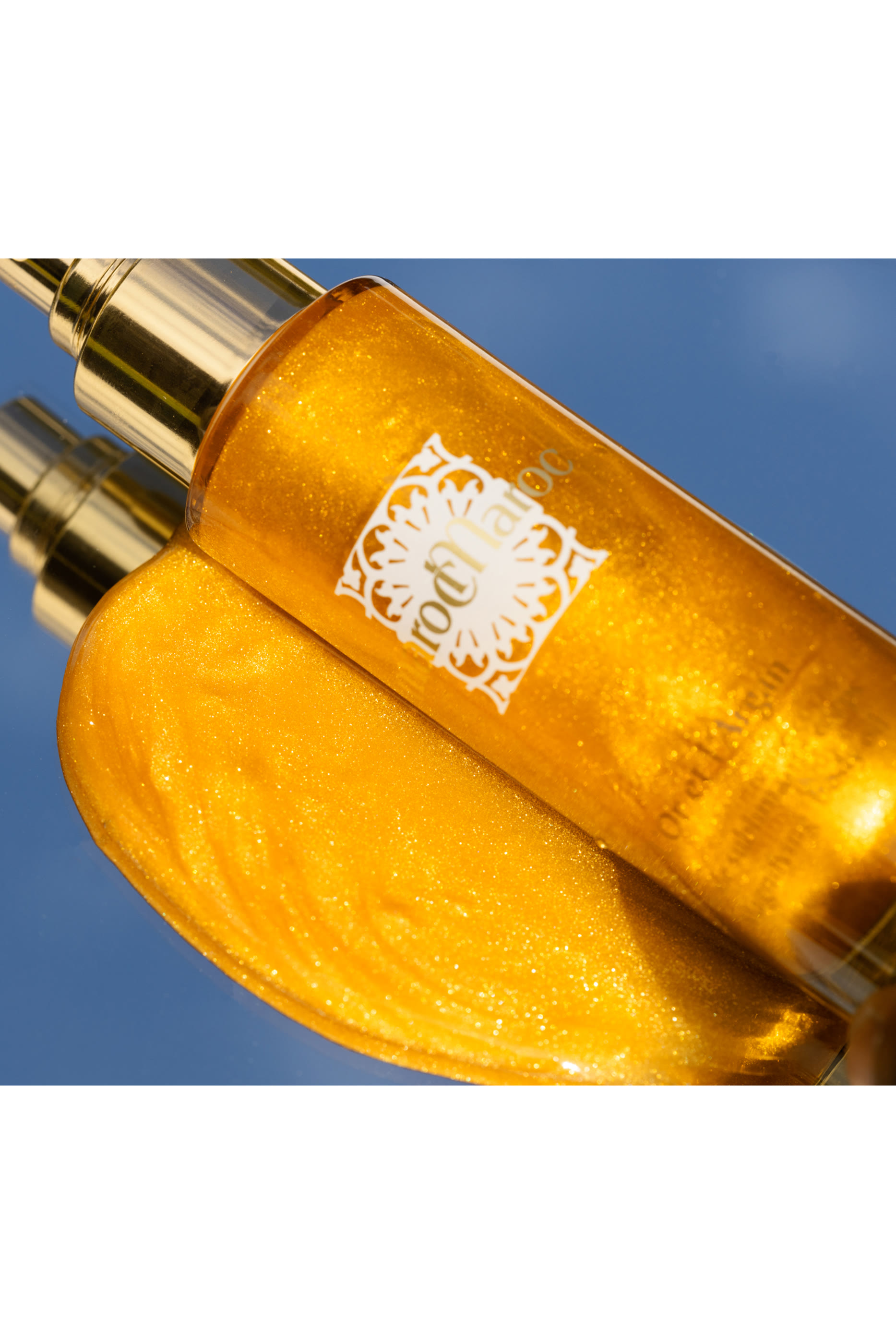 زيت ذهبي لإكساب الجسم اللمعان