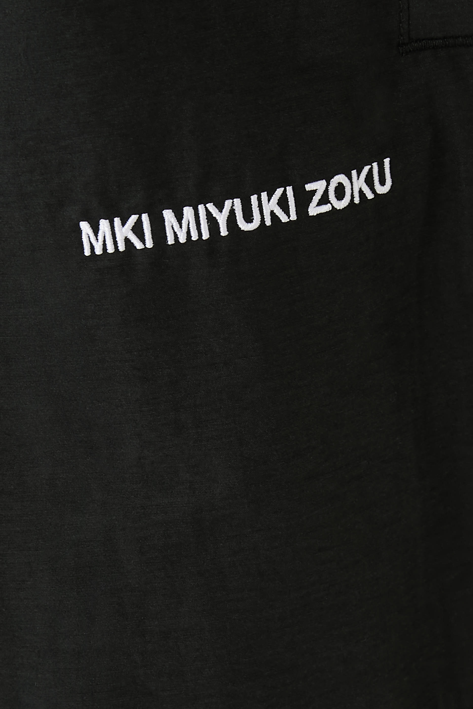 بنطال باراشوت بلون باهت نايلون قطني