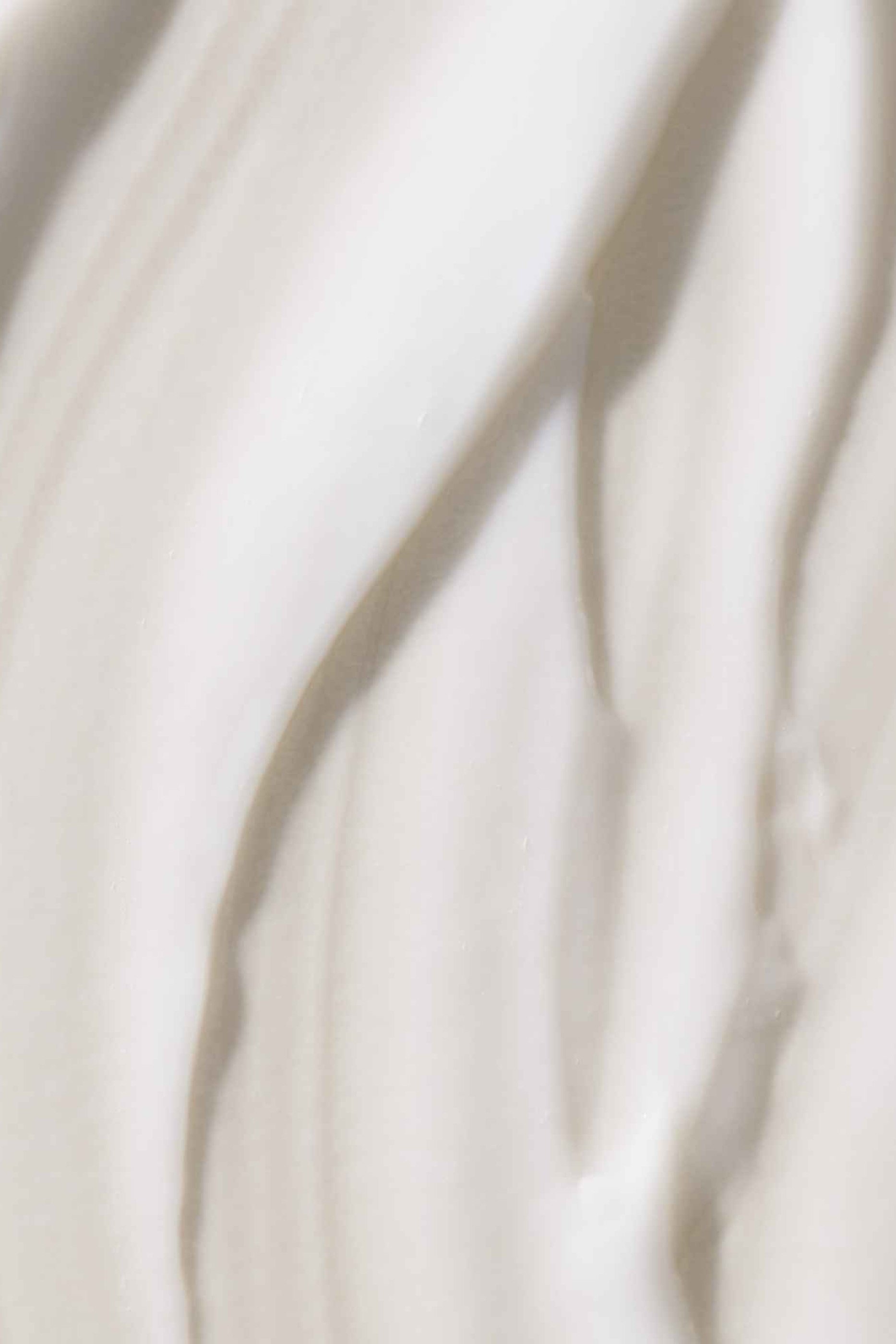 كريم تصفيف منعم ومضاد للتجعد