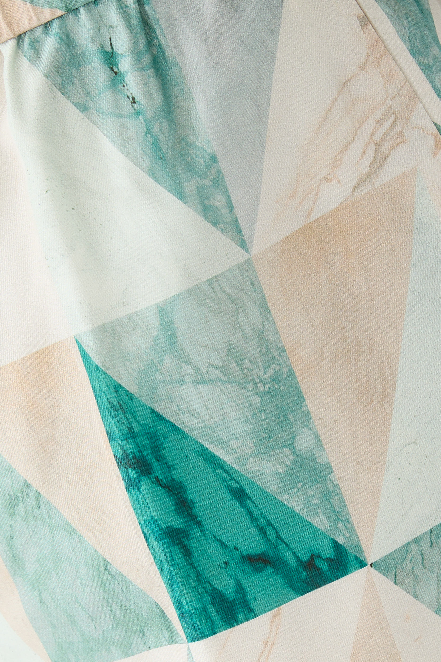 بنطال ثوريبس ماربل بطبعات حرير