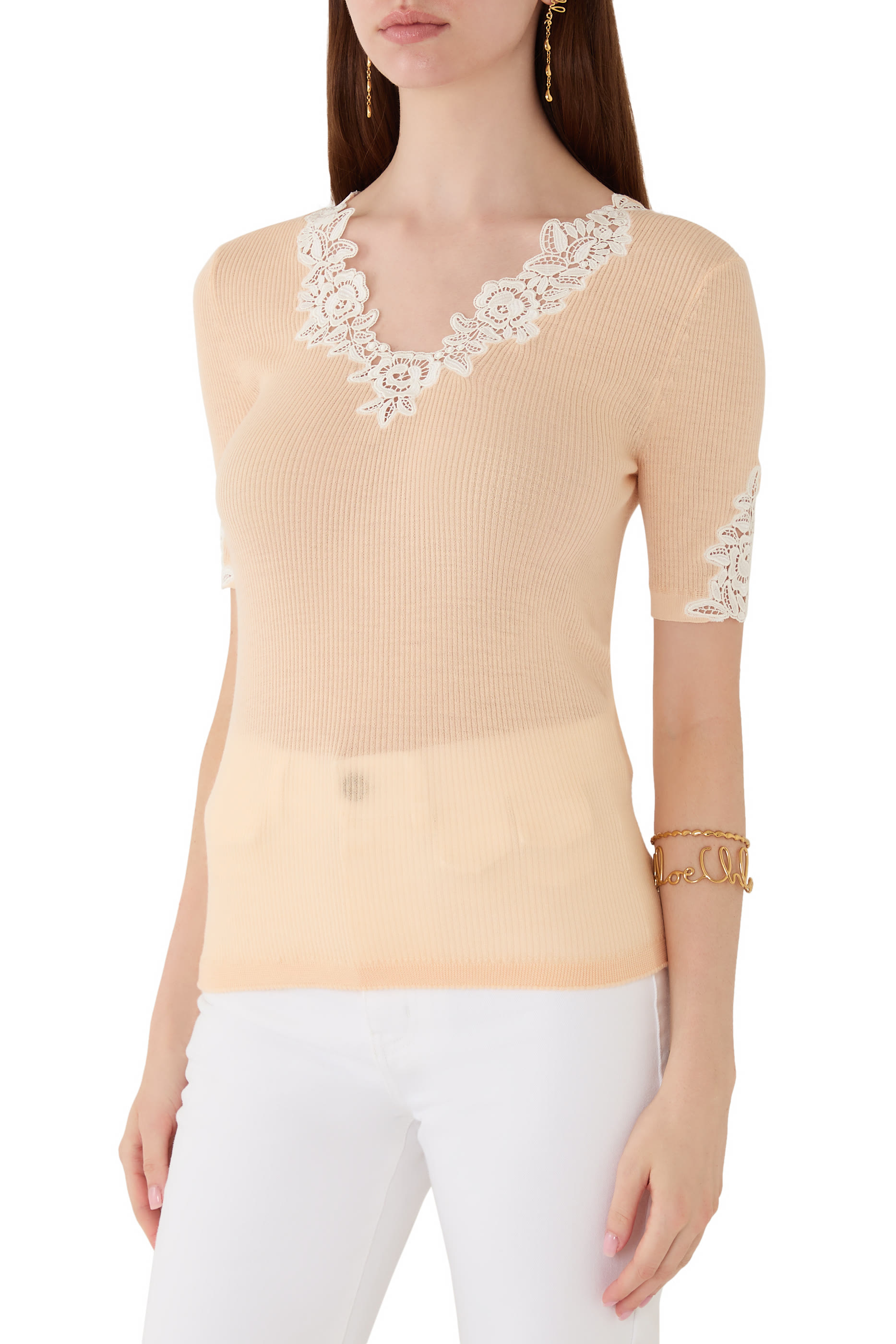 بلوزة بقصة ضيقة بأكمام قصيرة