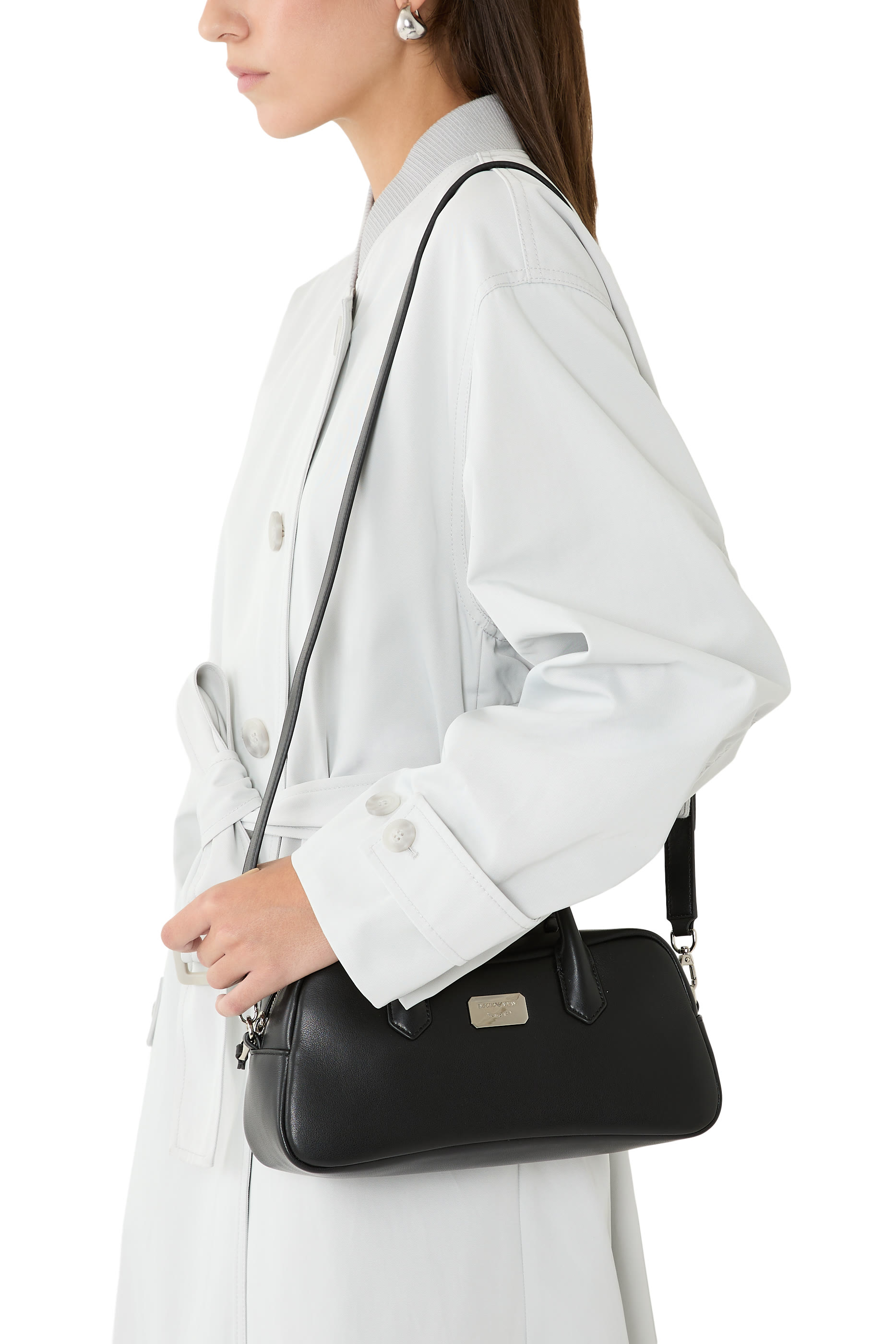 حقيبة يد بشعار الماركة جلد