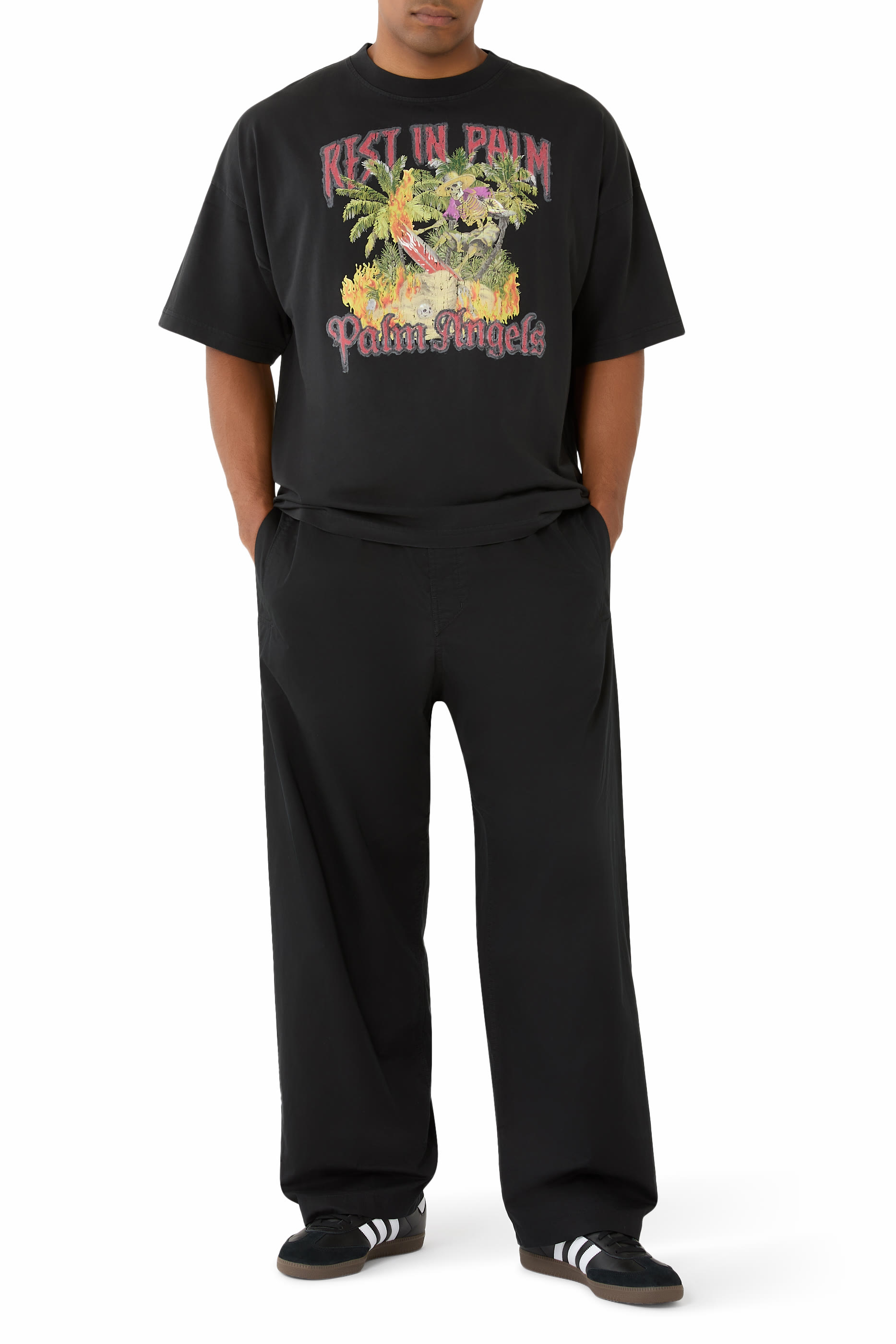 تيشيرت بشعار ريست إن بالم