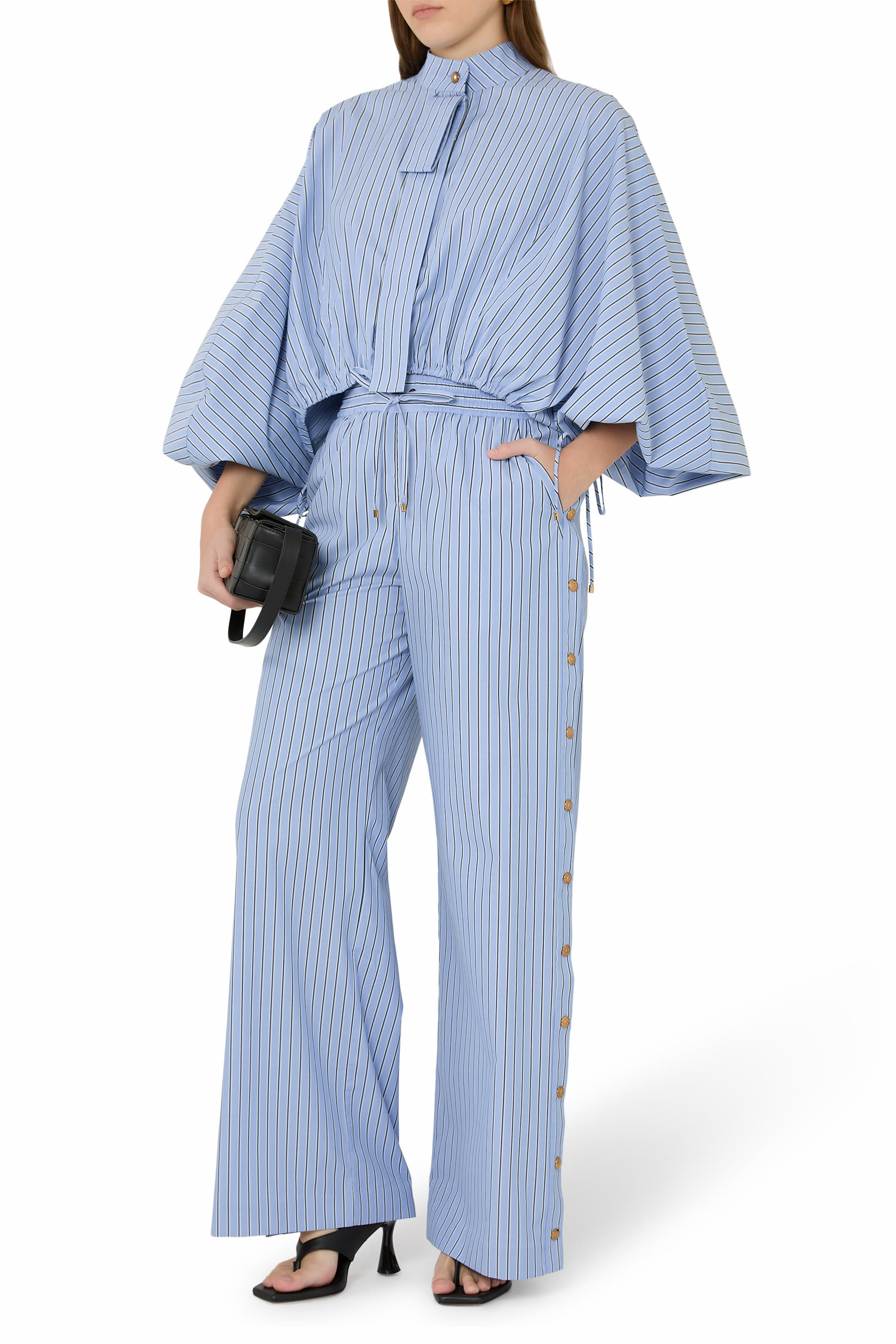 بنطال مخطط بأزرار كبس