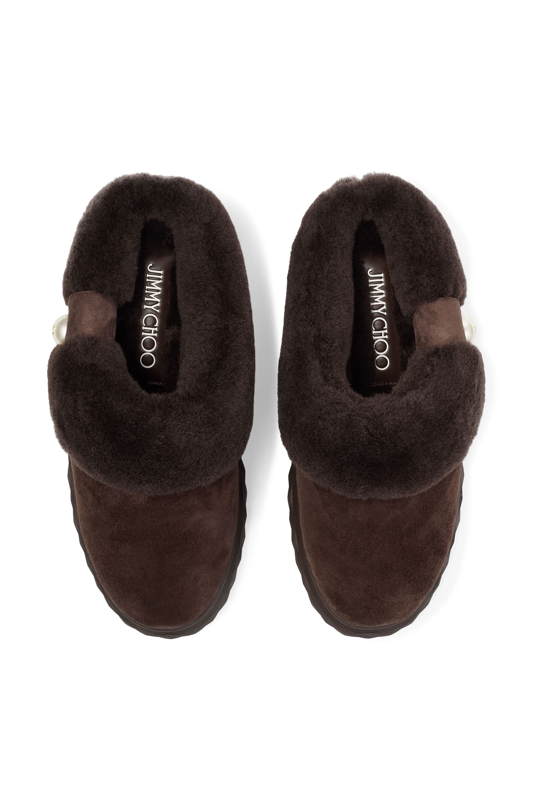 حذاء مفتوح من الخلف بتصميم معينات كبيرة