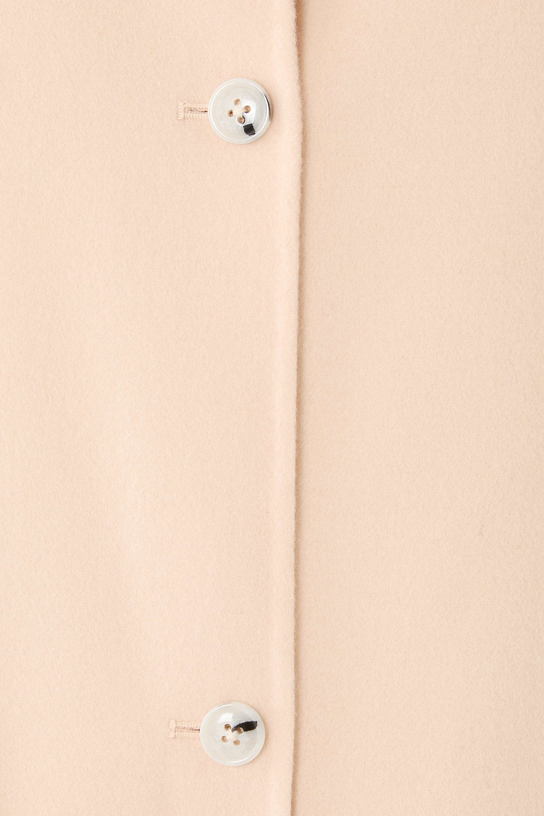 معطف كيري بقصة بيضاوية