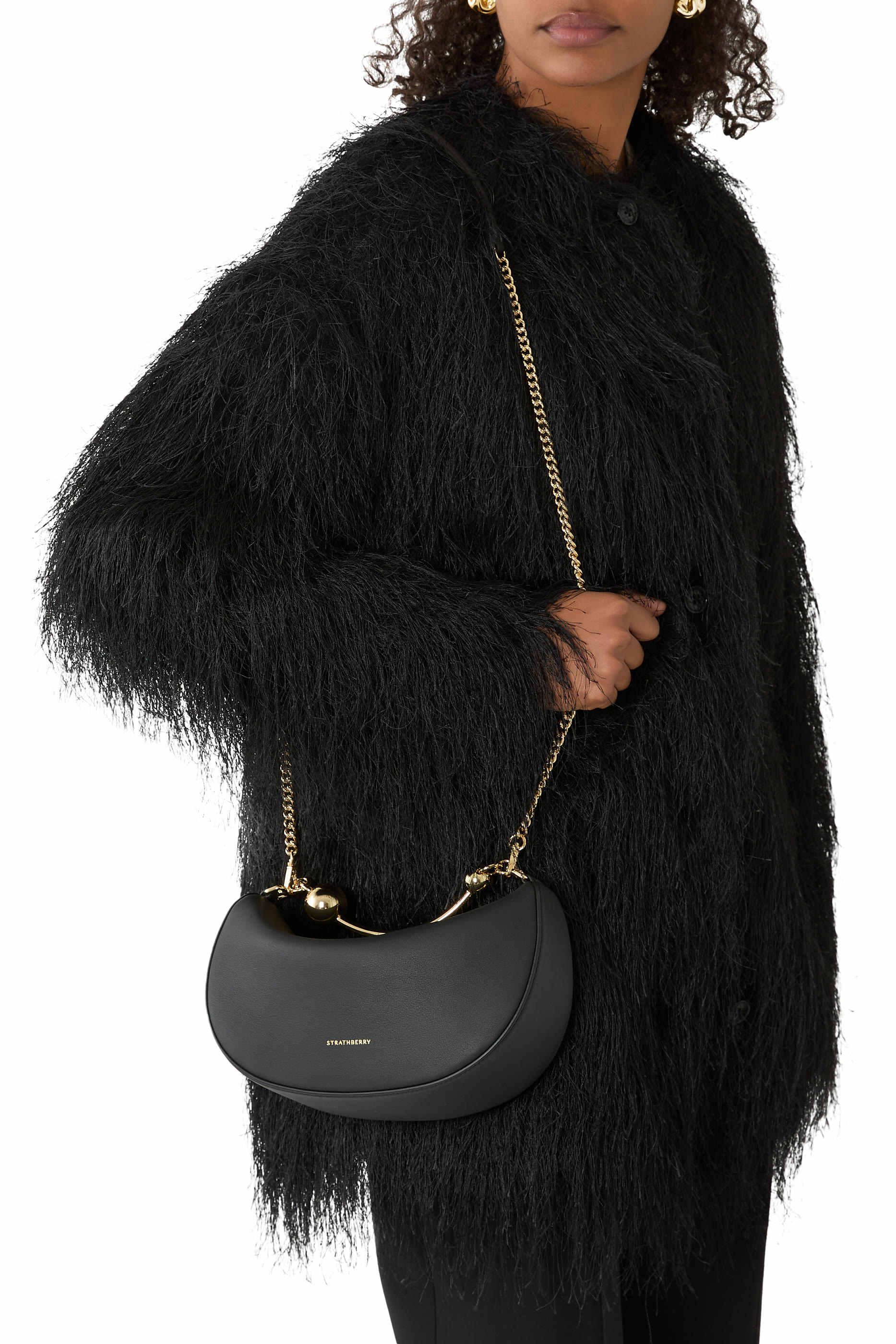 حقيبة صغيرة بتصميم مقوس